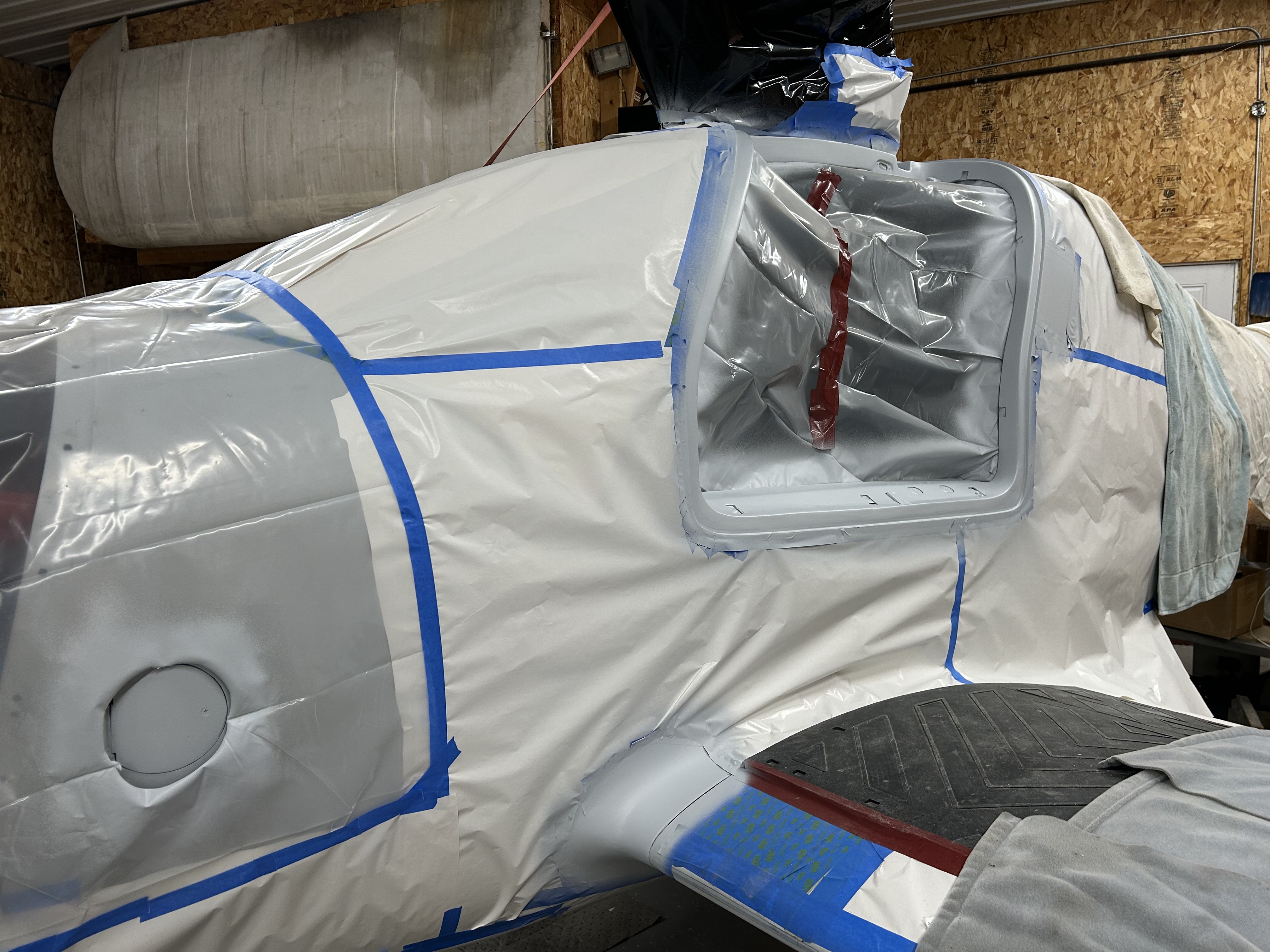 TKS Filler door, door jamb, and seat belt shoulder harness hard point primed.  Door jamb was body worked for a maximum of .060” gap between the door and the seal for minimum expansion of the inflatable door seal to seal the door.  Most areas were even tighter than that. All fill considered any side load on the seal during open and closing of door.